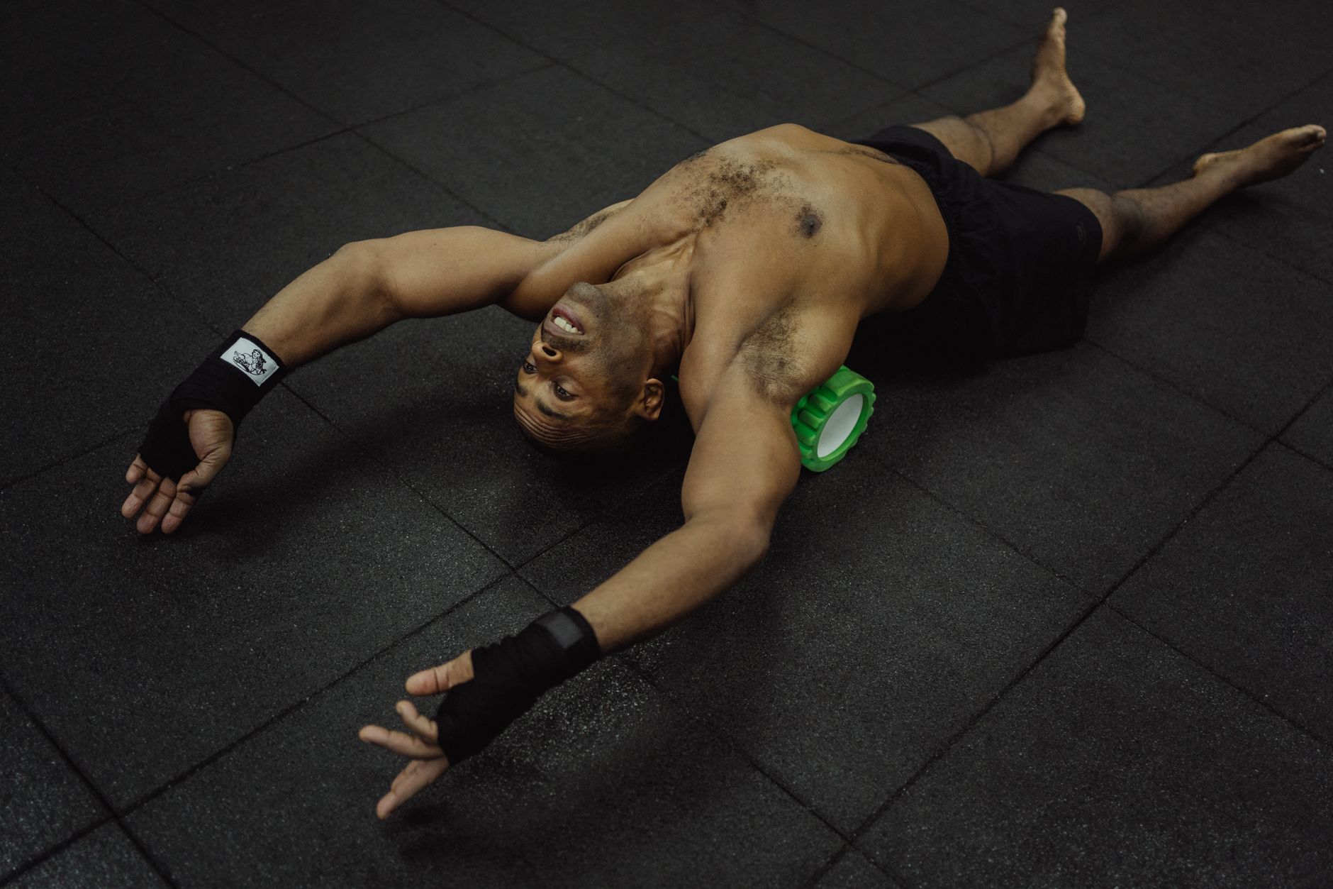 Athlete stretching during recovery work for Best training app for daily personalization.