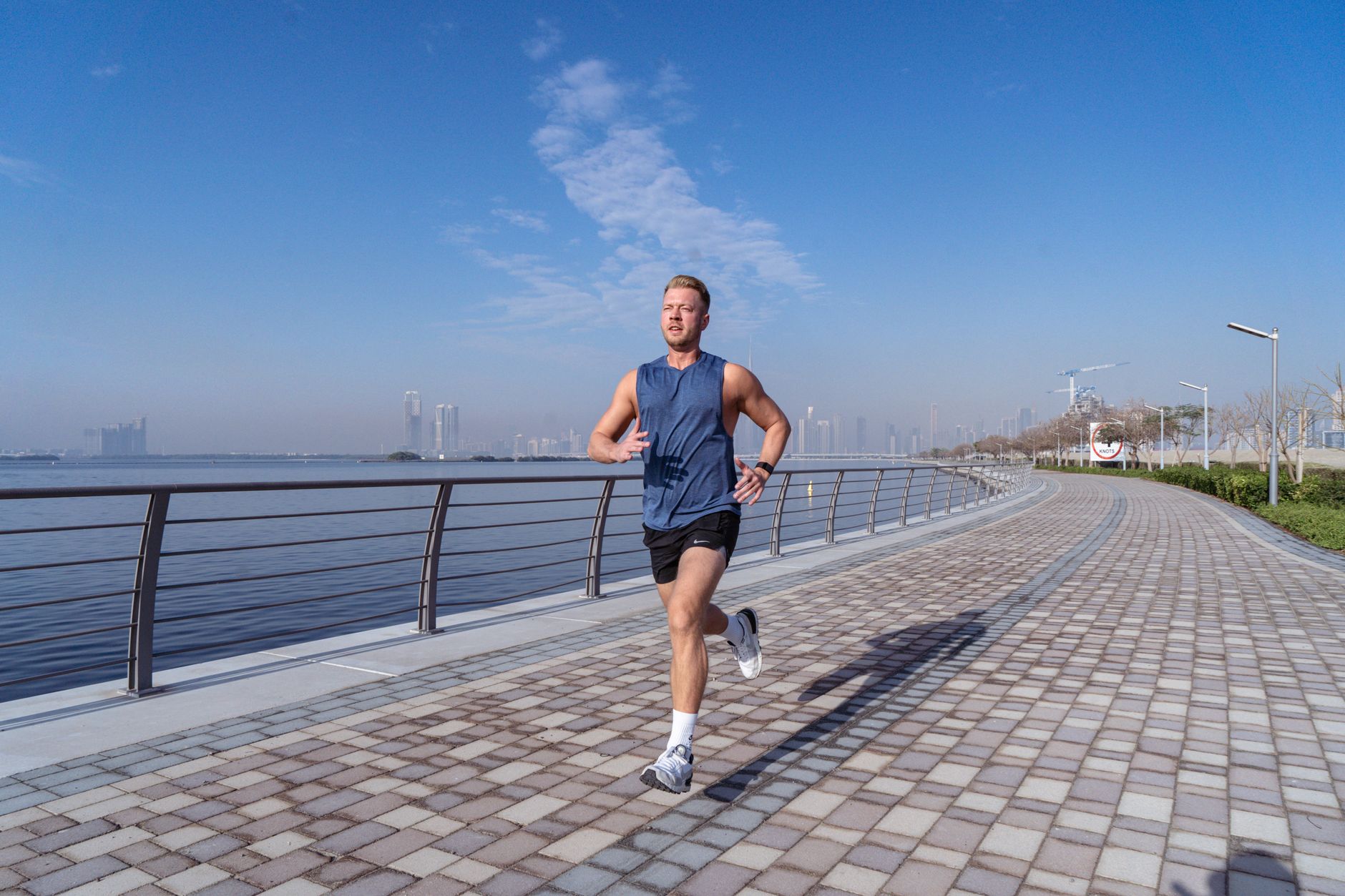 Runner training outdoors for Best offseason training app for cross-country runners.